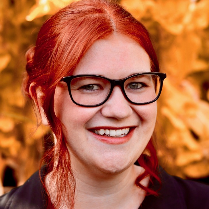 A picture of me! Red hair, black glasses, big smile :)