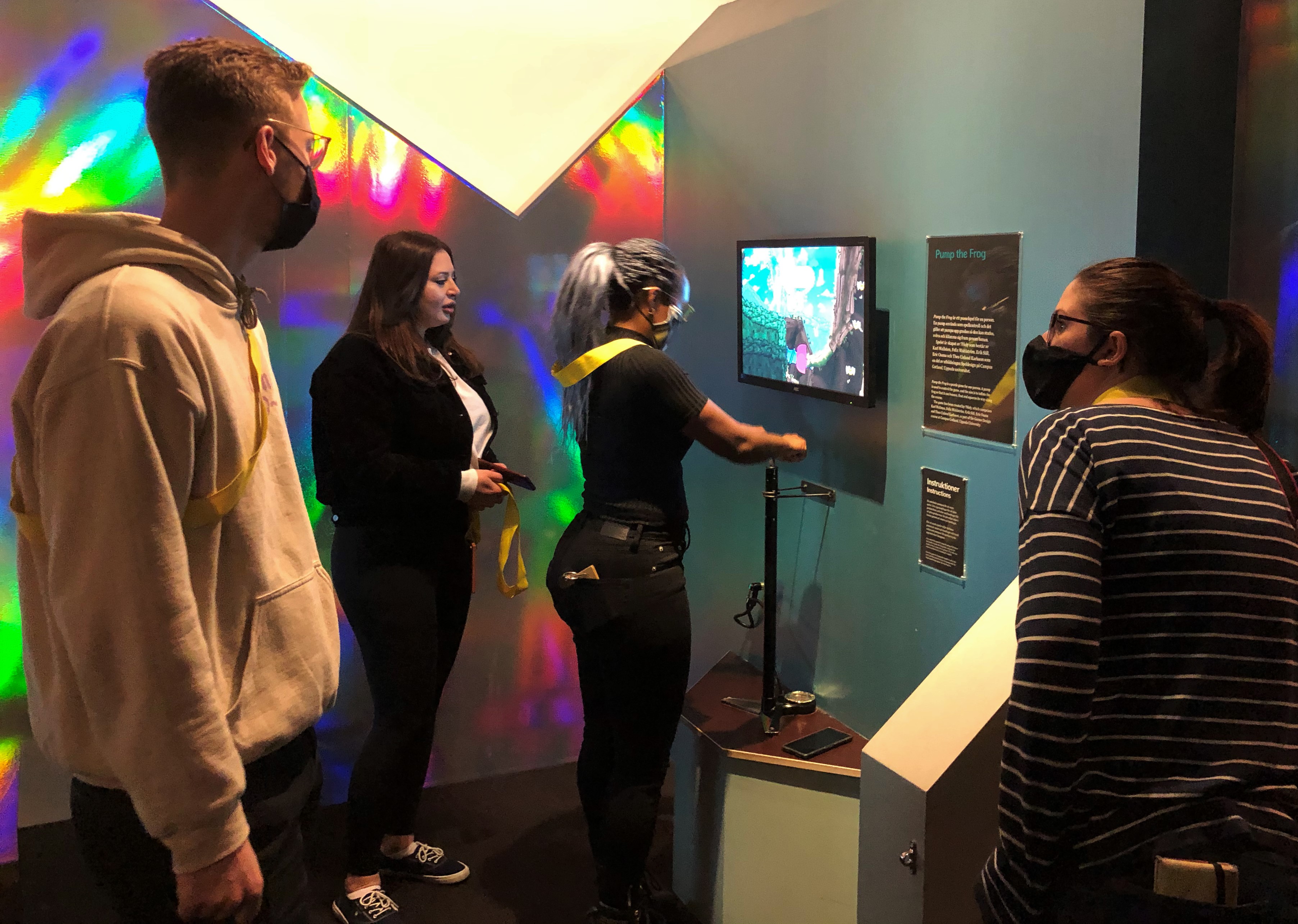 The group visiting the exhibition, playing games